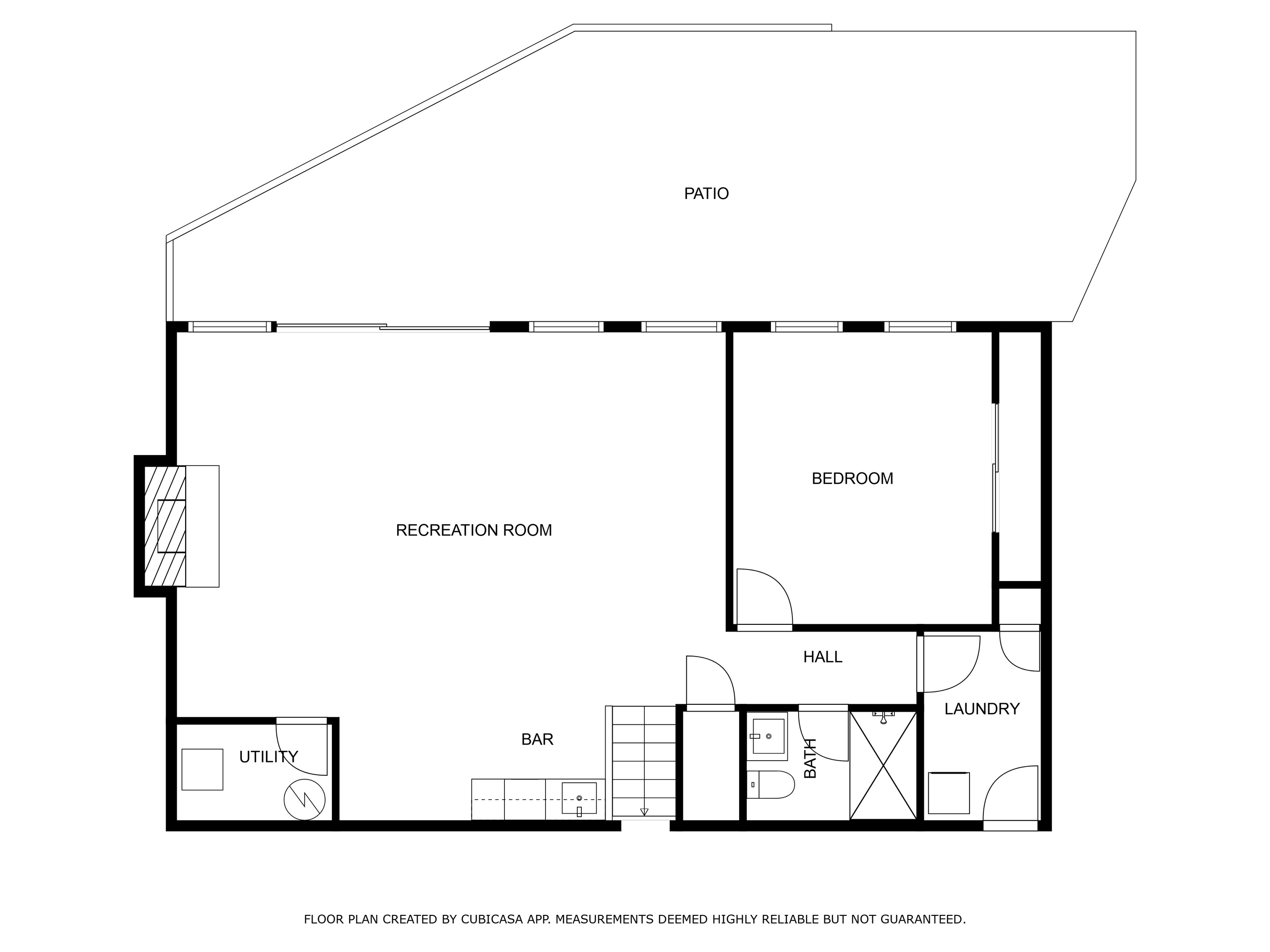 Lower level floor plan with recreation room, wet bar, bedroom, laundry and walk-out patio