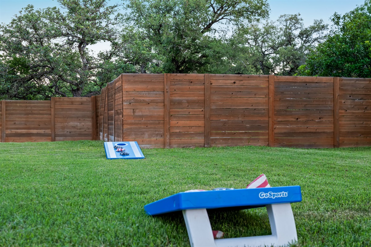 Challenge friends and family to a game of cornhole in the spacious fenced backyard. With plenty of open lawn space, it’s perfect for outdoor games, group fun, and relaxing afternoons outside.
