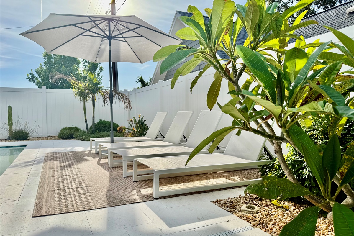 Lounge poolside with a cold drink, fire up the grill, or gather around the outdoor dining table with your crew.