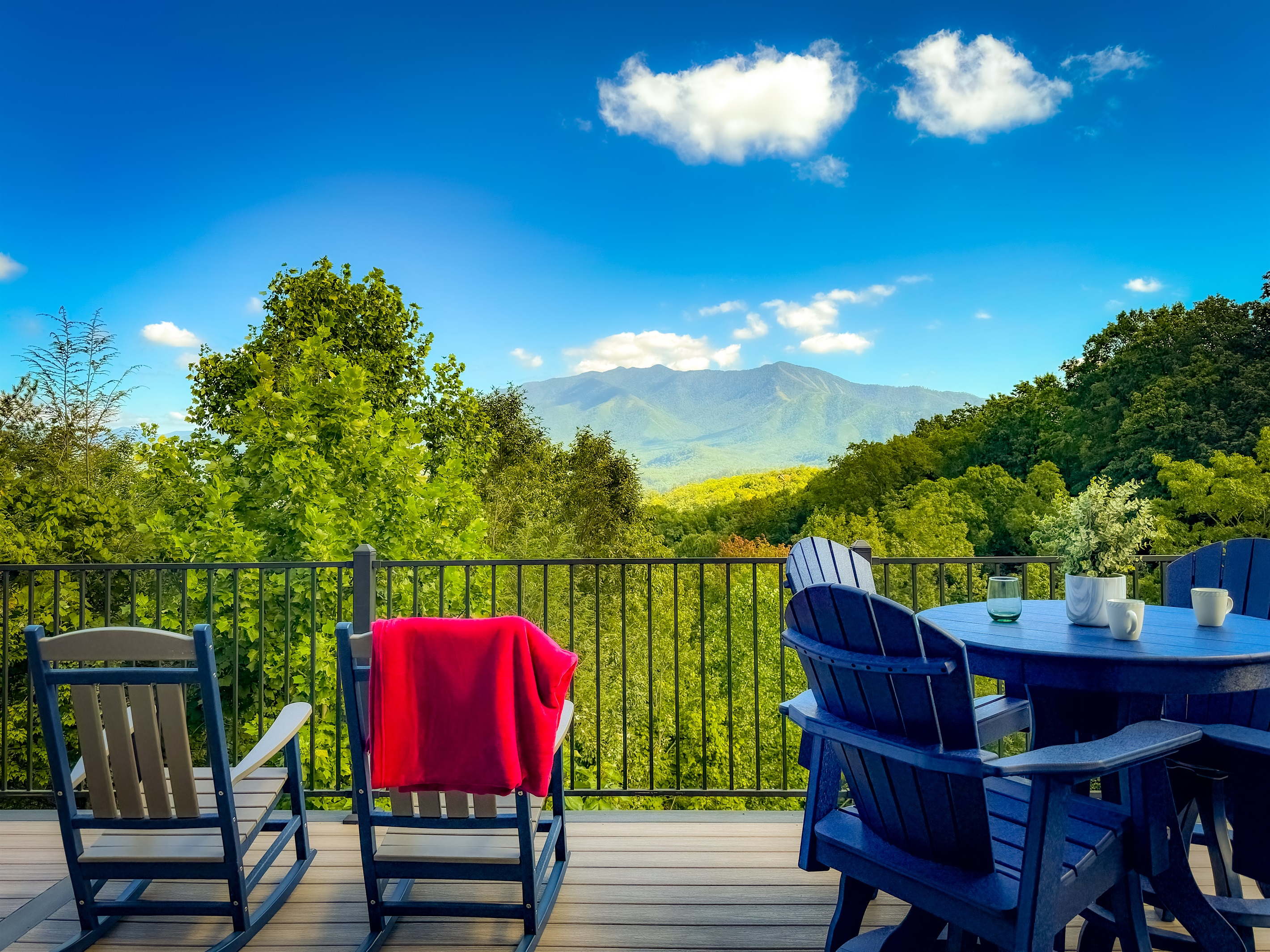 What a view to go with that morning coffee, afternoon snack, or evening beverage. One of tne greatest, if not the best, view of Mt Leconte.