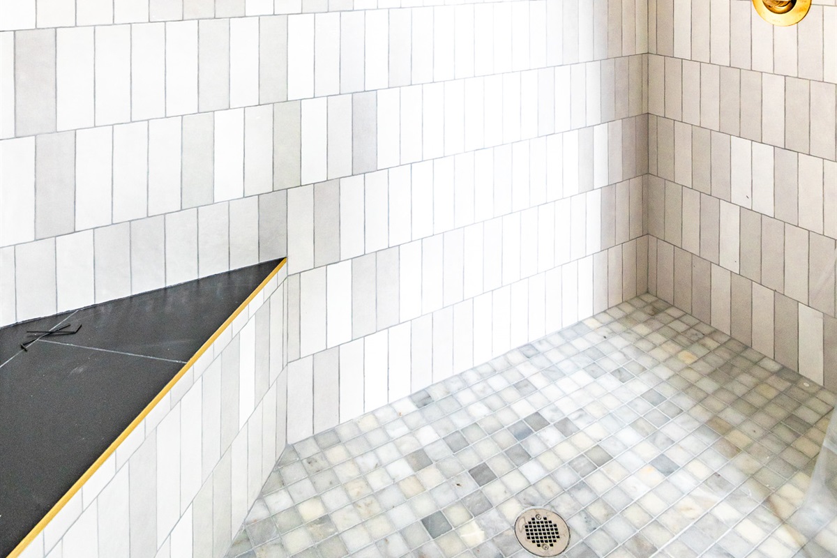 Find ultimate comfort in large walk-in shower.