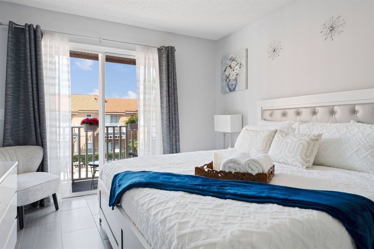 At the second floor is this Prime Bedroom Suite, with a King size bed, balcony and 58 inch ROKU SMART TV.