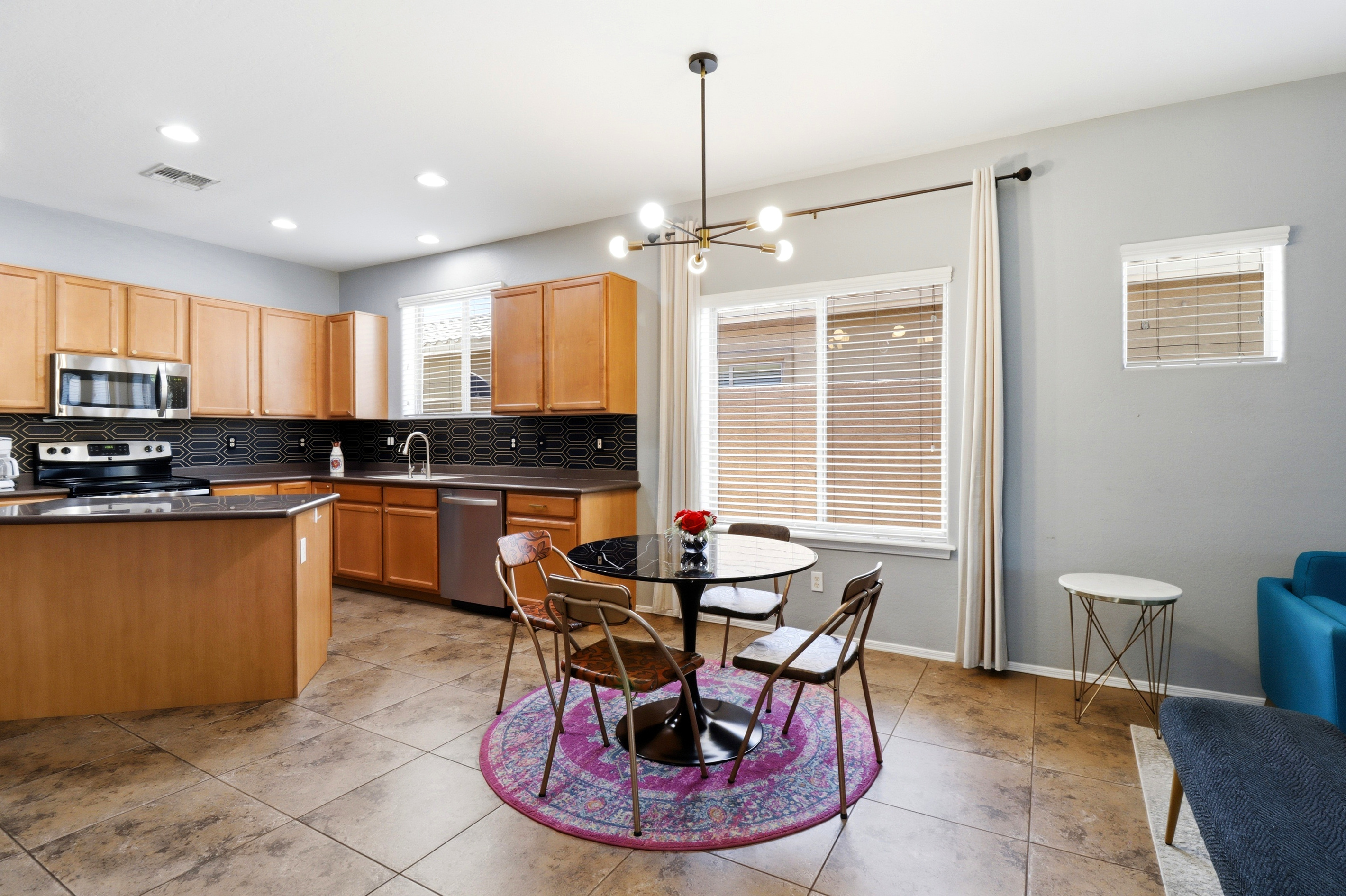 Bright open-concept dining and living space.