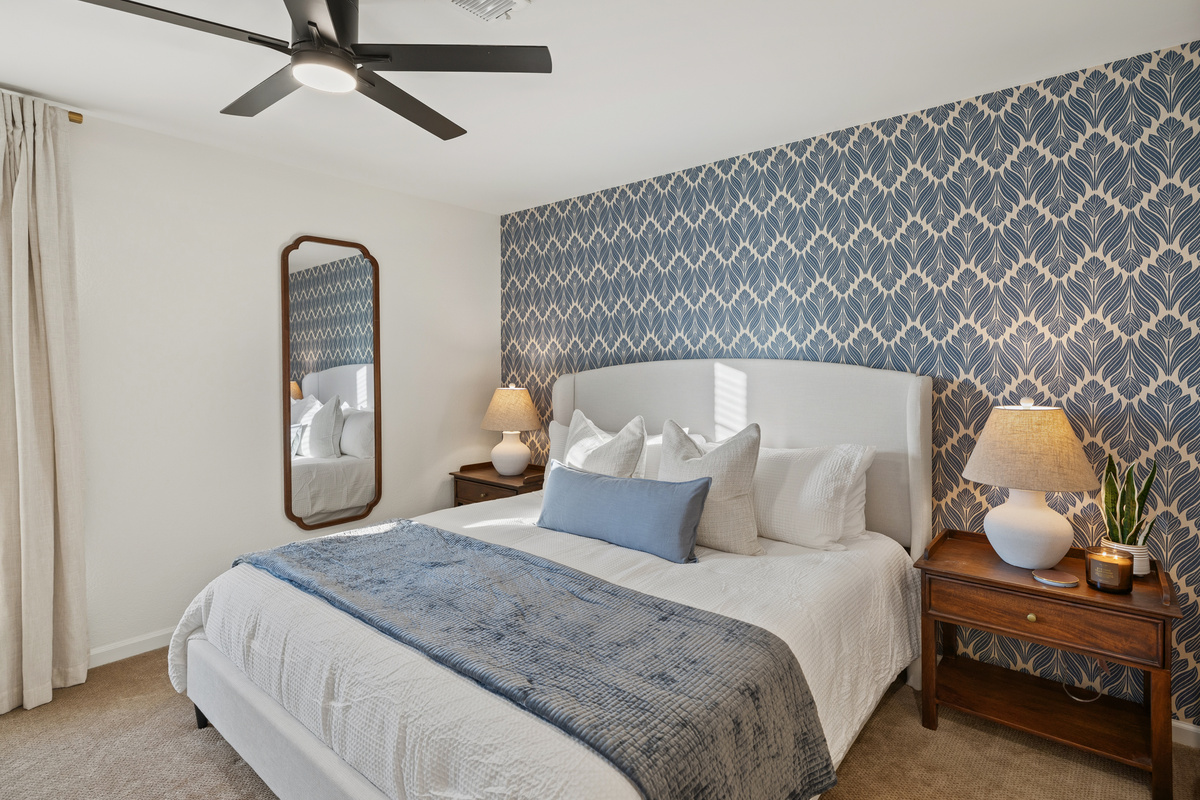 Pillow-top king, bamboo sheets, and hotel pillows. Blackout curtains take care of the night game.