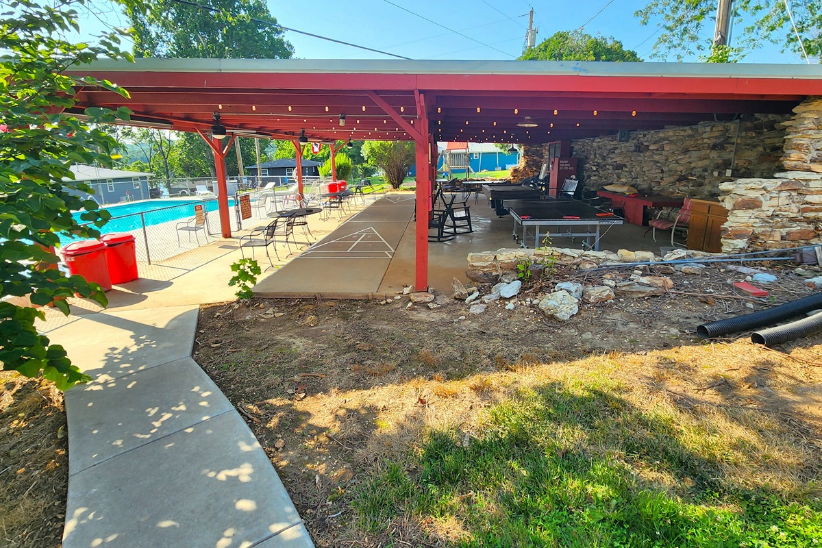 Second view of the pavilion shows it's placement beside the pool. Such a fun gathering area!