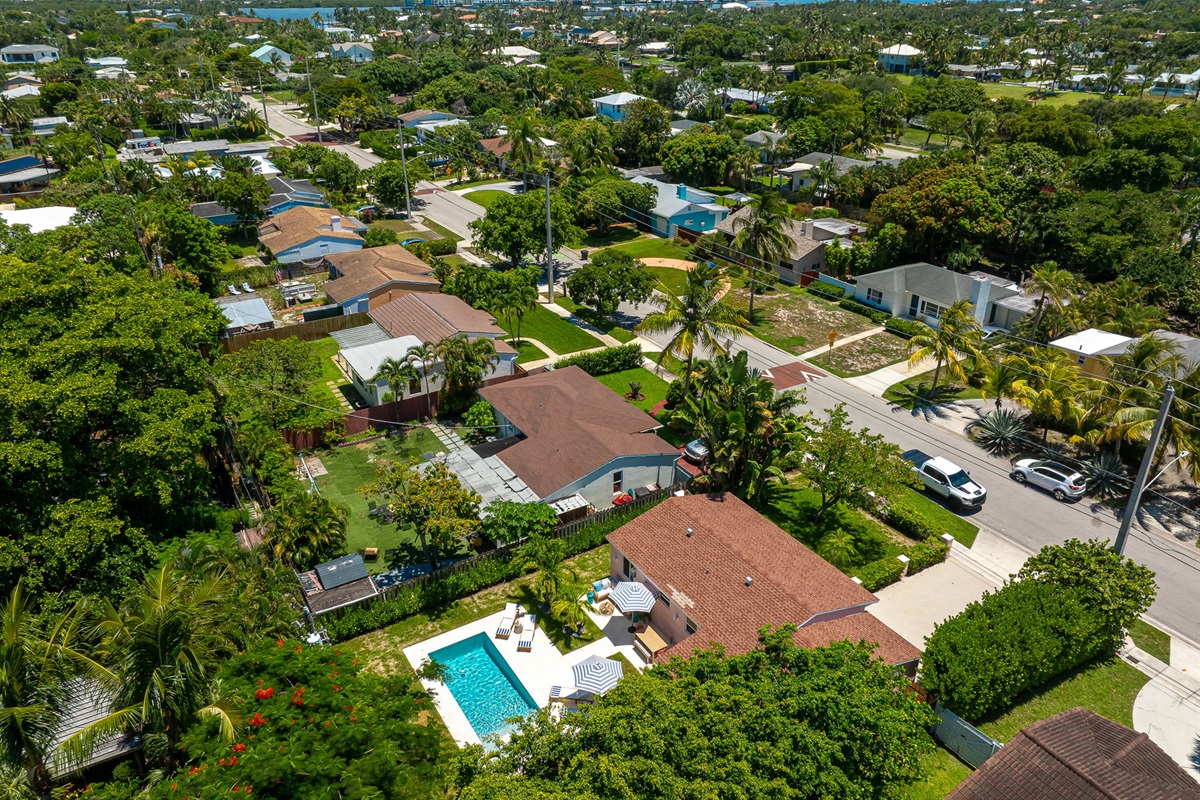 Aerial views of this SoSo West Palm Beach gem, nestled in a safe, family-friendly neighborhood just minutes from top beaches, dining, and amenities.