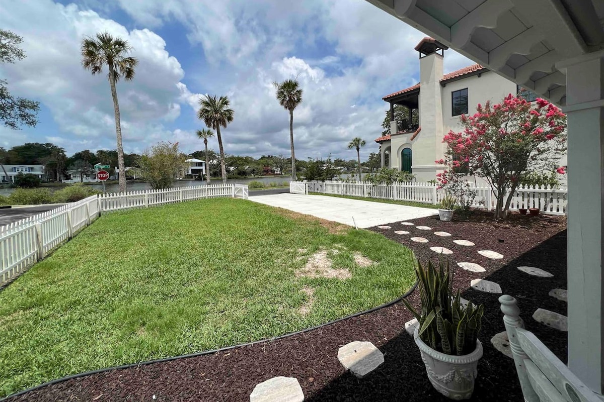 New driveway, and still plenty of yard to play! Gate allows you to enclose the driveway for young guest safety. 