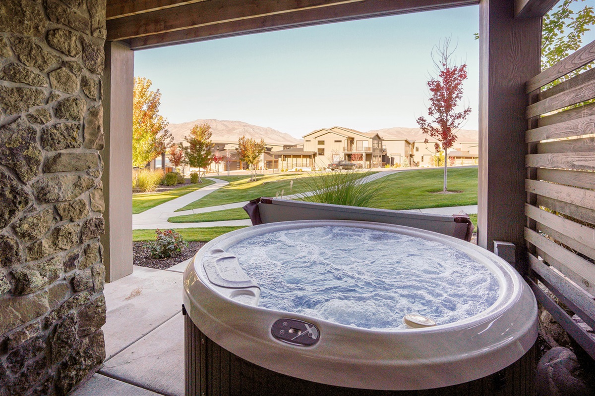 Private covered hot tub—perfect for relaxing after a day of adventure