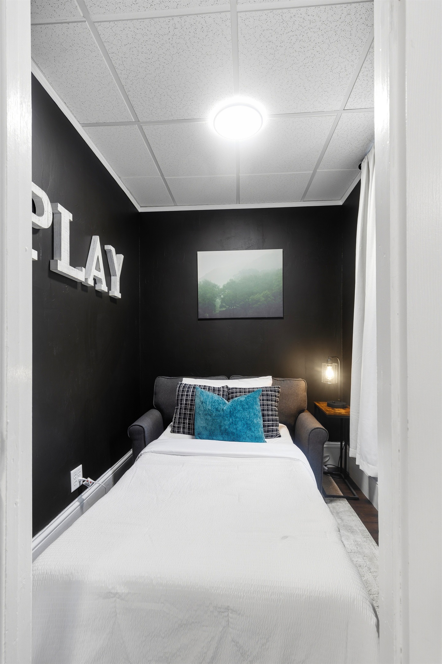 Sleeper sofa in upper game room