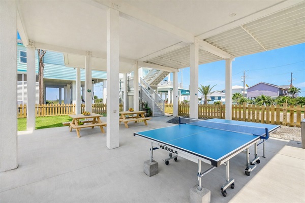 Ground Level Ping Pong Area: Covered recreation zone for all-weather fun.