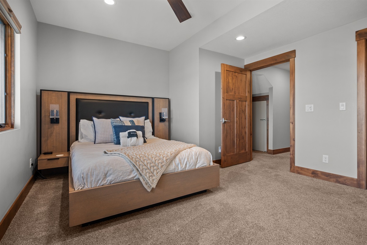 Comfortable guest room with plush bedding and modern design