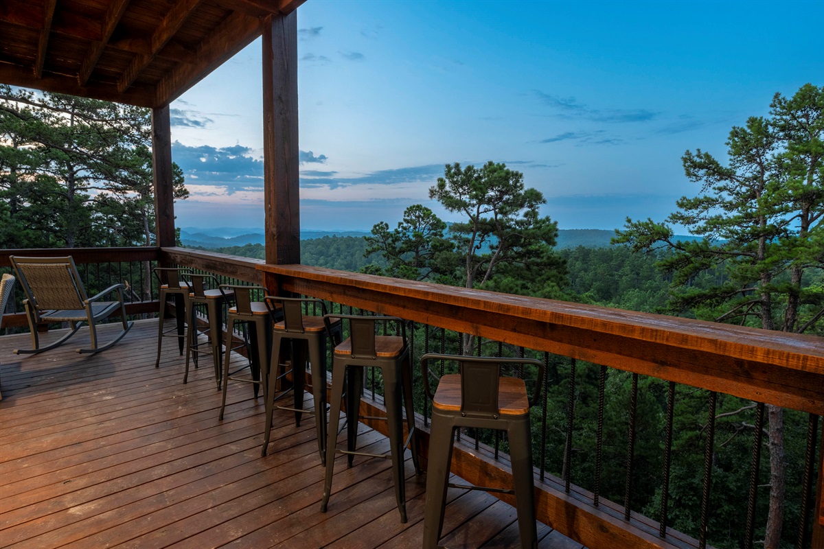 Scenic outdoor dining area overlooking endless mountain views