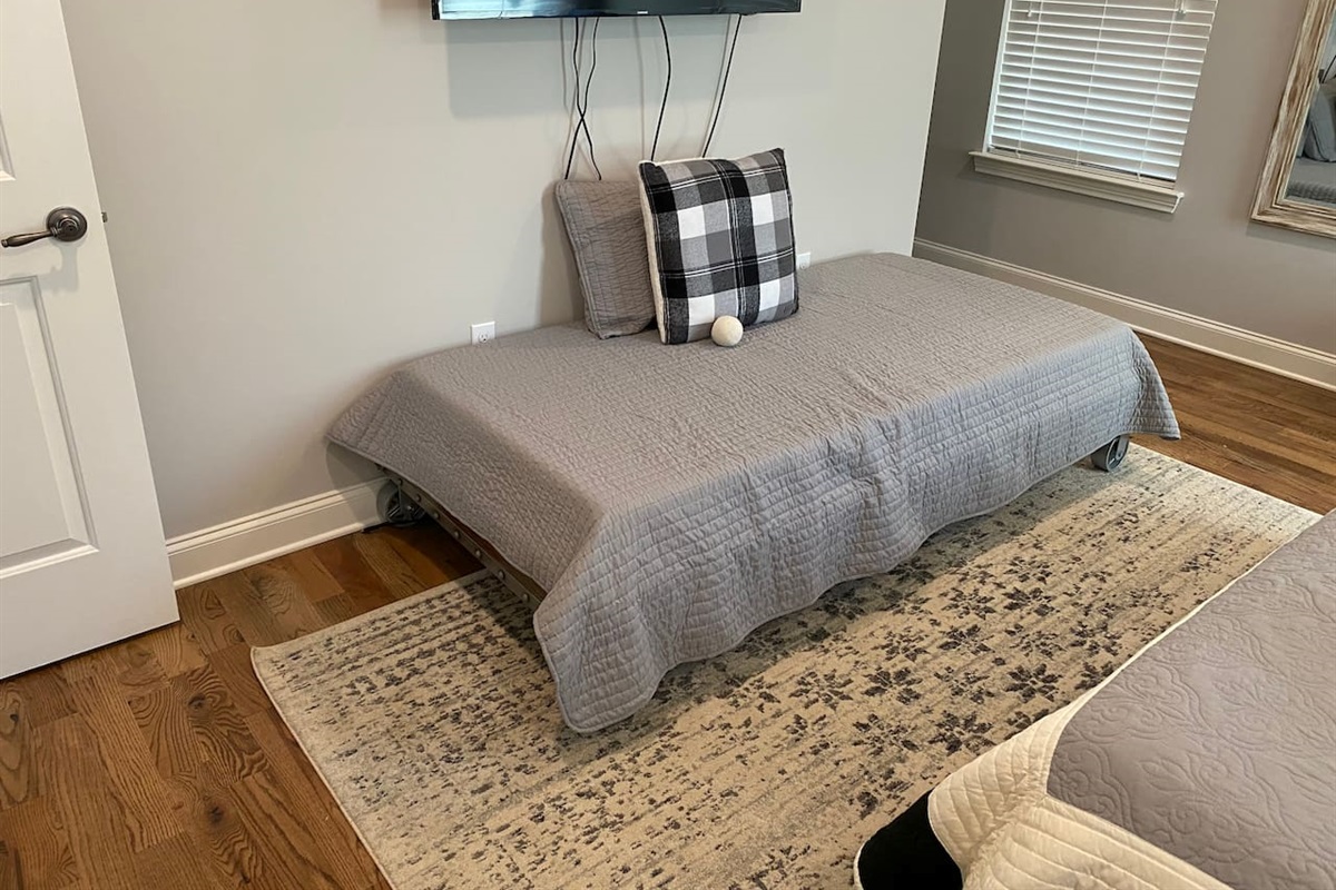 Twin trundle in room 1 of main level bedroom.