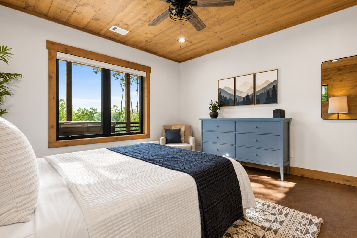 The gentle blues and cozy vibe of this room make it feel like floating in the forest.