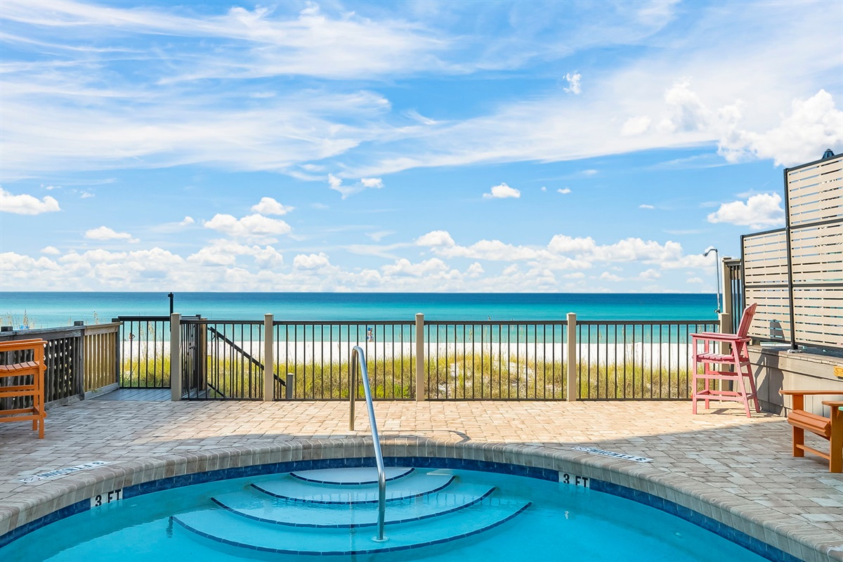 Swim, sun, or stroll: enjoy the shared beachfront pool, sundeck, outdoor shower, and private boardwalk to the sand — plus a shared grill for those perfect cookout nights.