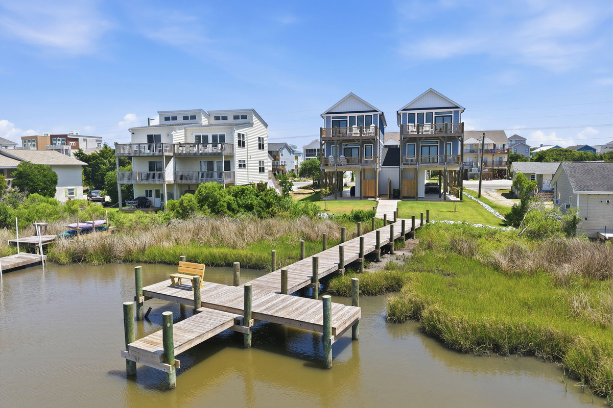 The private dock and boardwalk provide a peaceful place to relax while enjoying stunning marshfront scenery