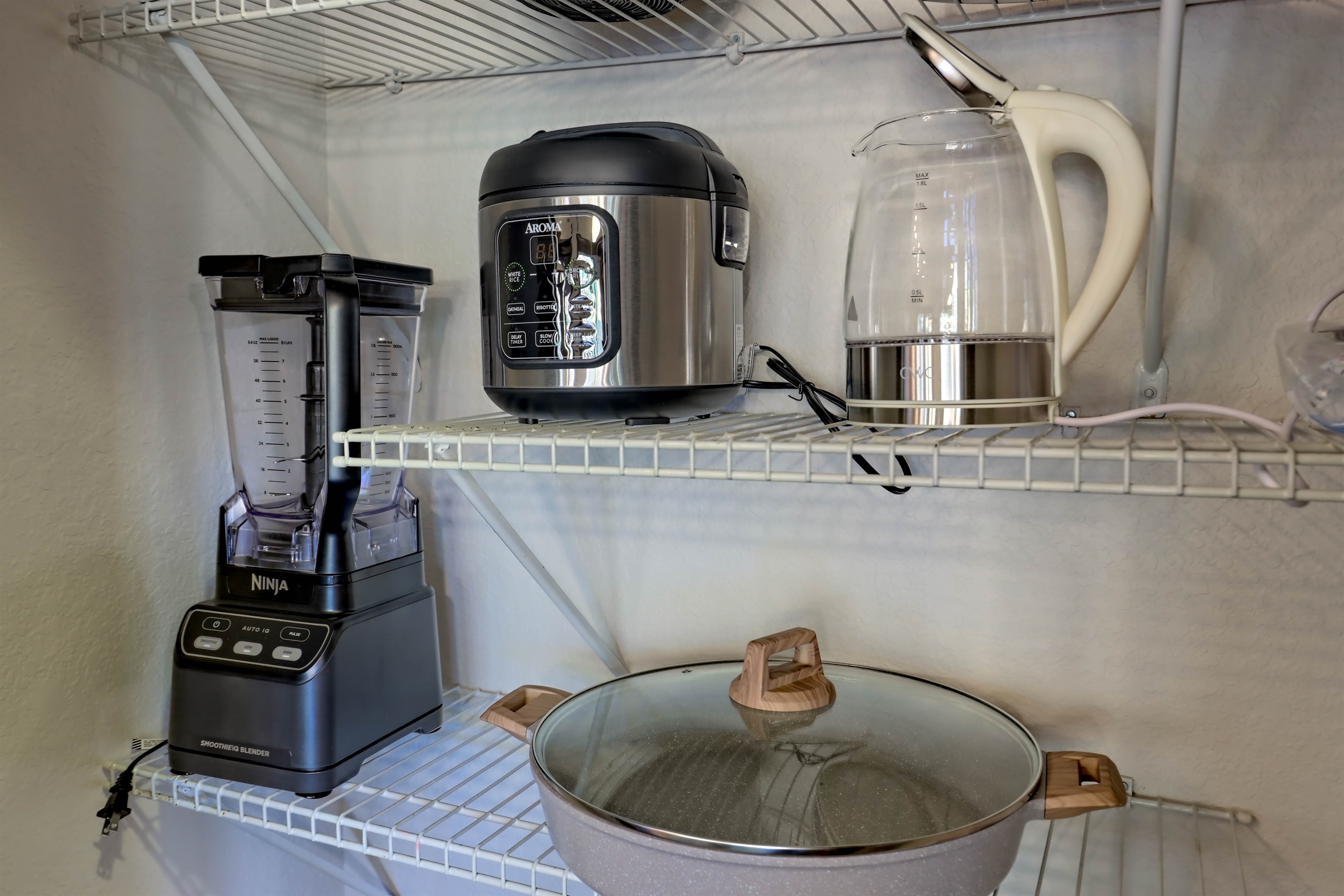 Blender, rice cooker, and electric kettle for easy meal prep.