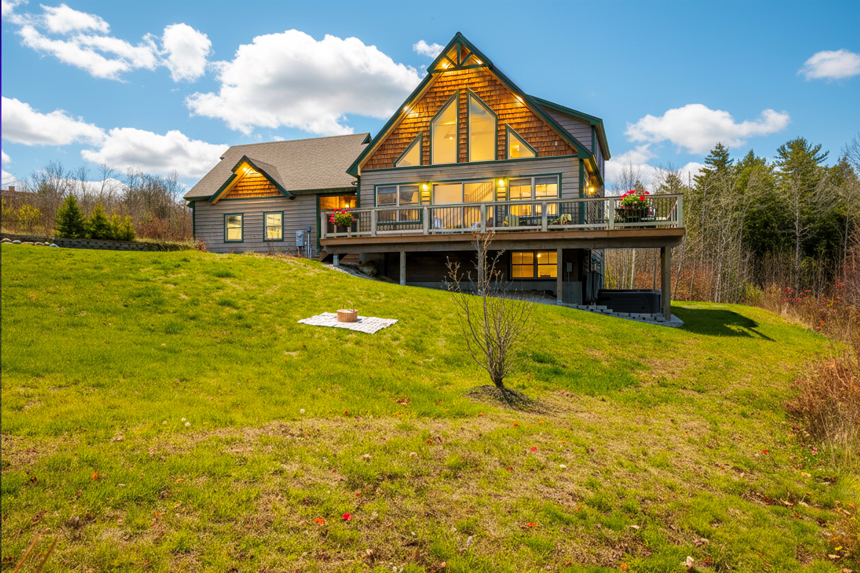 Enjoy the inviting lodge exterior framed by breathtaking mountain scenery.