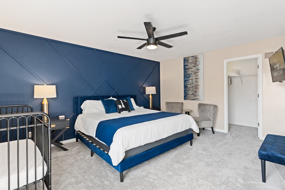 The second king suite offers plush bedding, a private bath, a full-sized baby crib, and the ultimate in comfort.