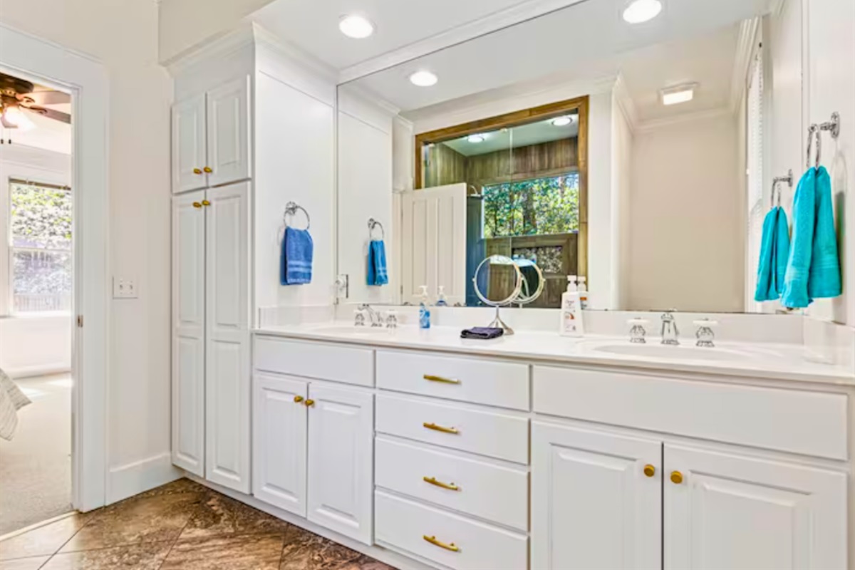 Double Sink Vanity with a Large Mirror, Bright Lights and Tons of Storage