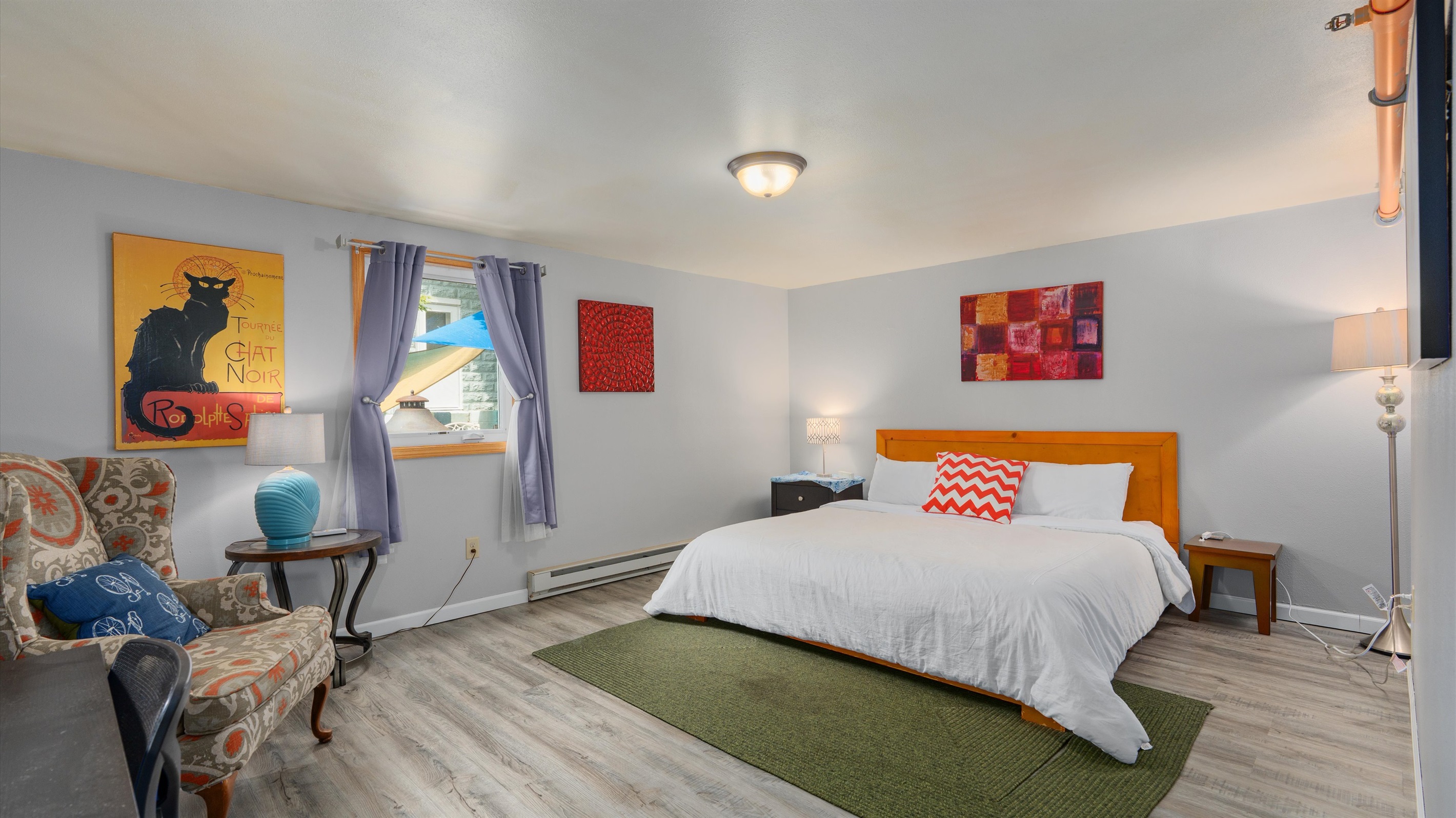 Eclipse's lower bedroom offers a great king bed, small writing area and nice AC off the patio area.