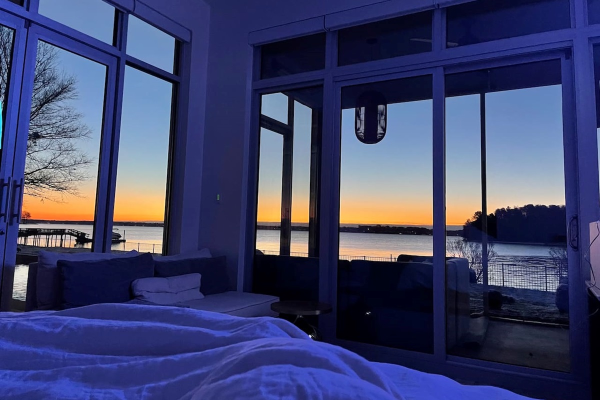 Enjoy sunrises from the master bedroom with electronic shades that can be controlled from your bed.