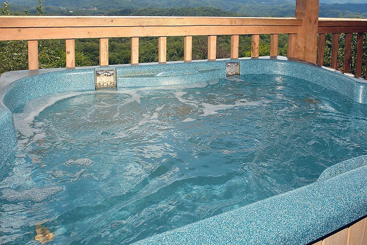 Hot tub with amazing views to enjoy after a day of playing in the mountains