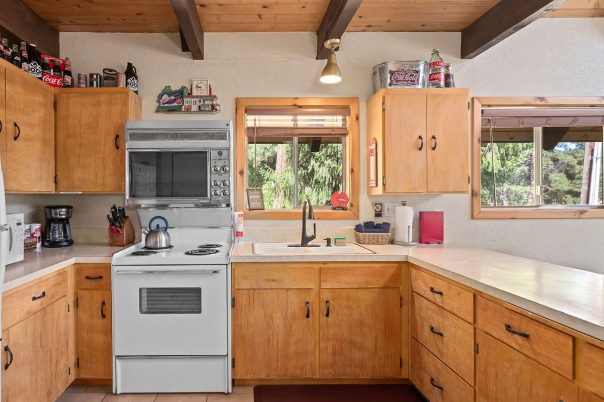 Private balcony overlooking the trees — the perfect morning coffee spot.