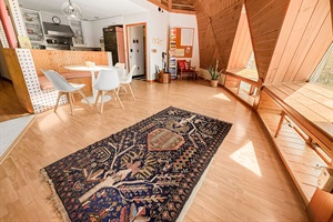 kitchen and dinning room with windows facing the lake
