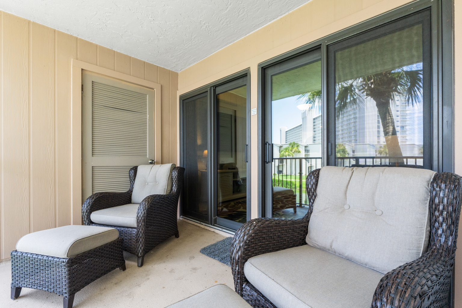 Balcony off Living Room with Outdoor Seating