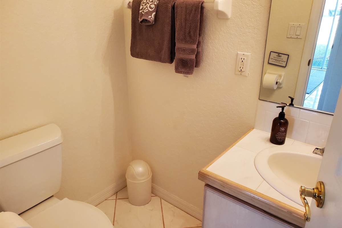 1/2 bath located near the Queen and Twin bedroom
