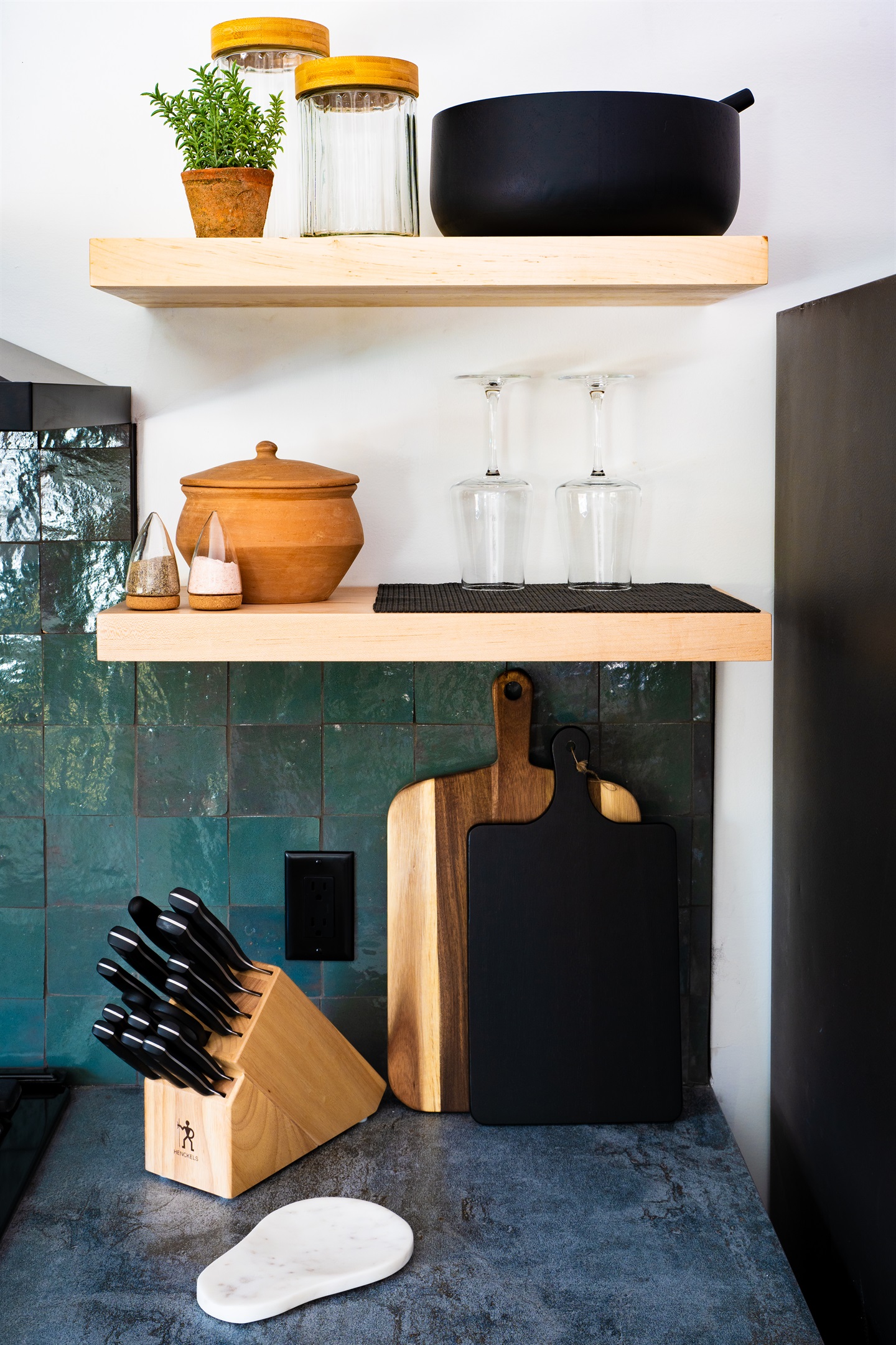 Charming kitchen details with natural wood accents, open shelving, and essentials for easy meal prep.