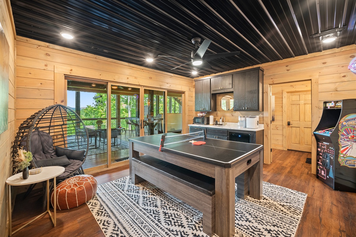 Cozy seating and beautiful views make this outdoor living space an ideal spot to enjoy the fresh mountain air.