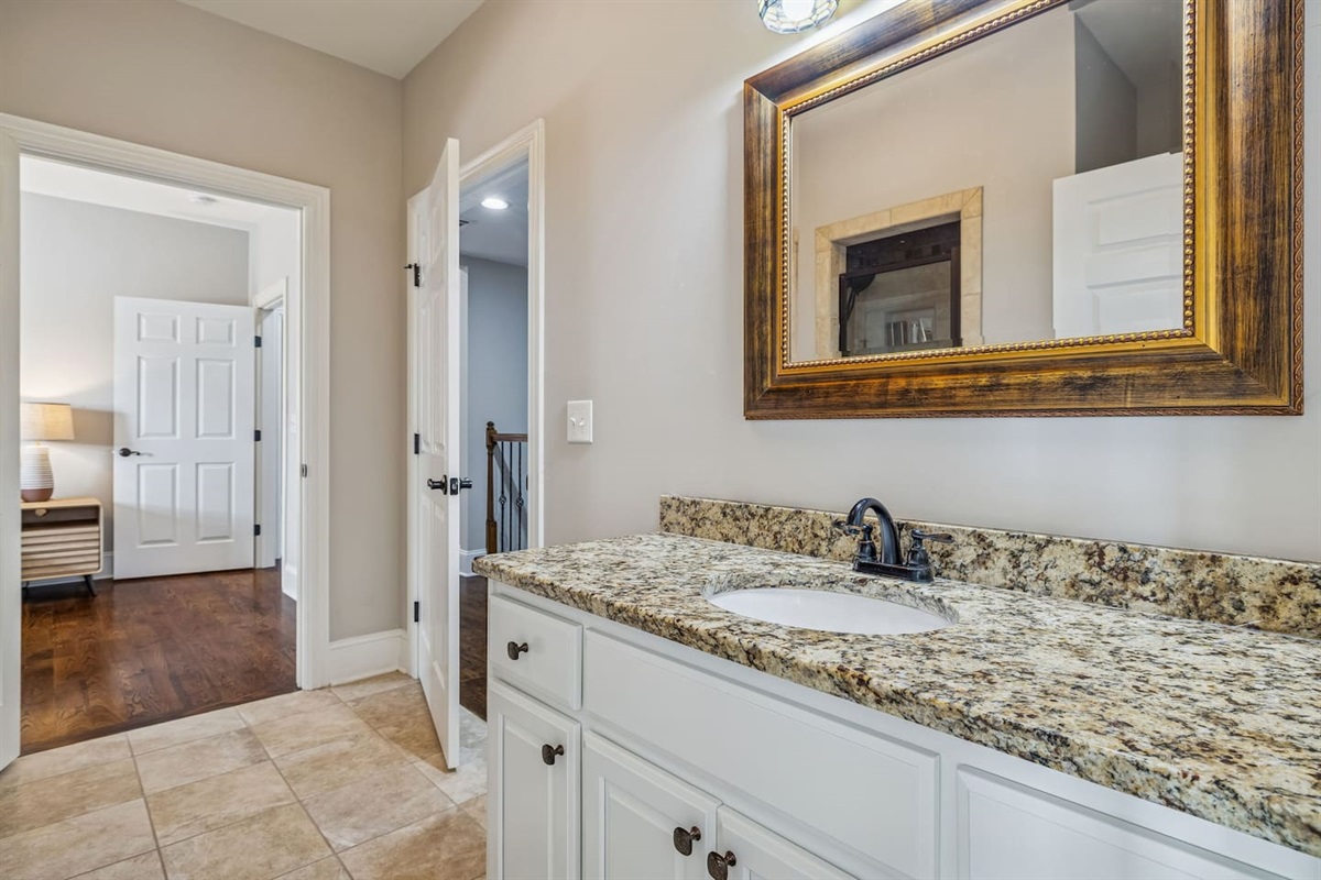 Upstairs bathroom with view of Green Bed bedroom