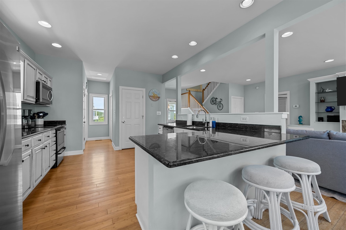 Open-concept kitchen with breakfast bar