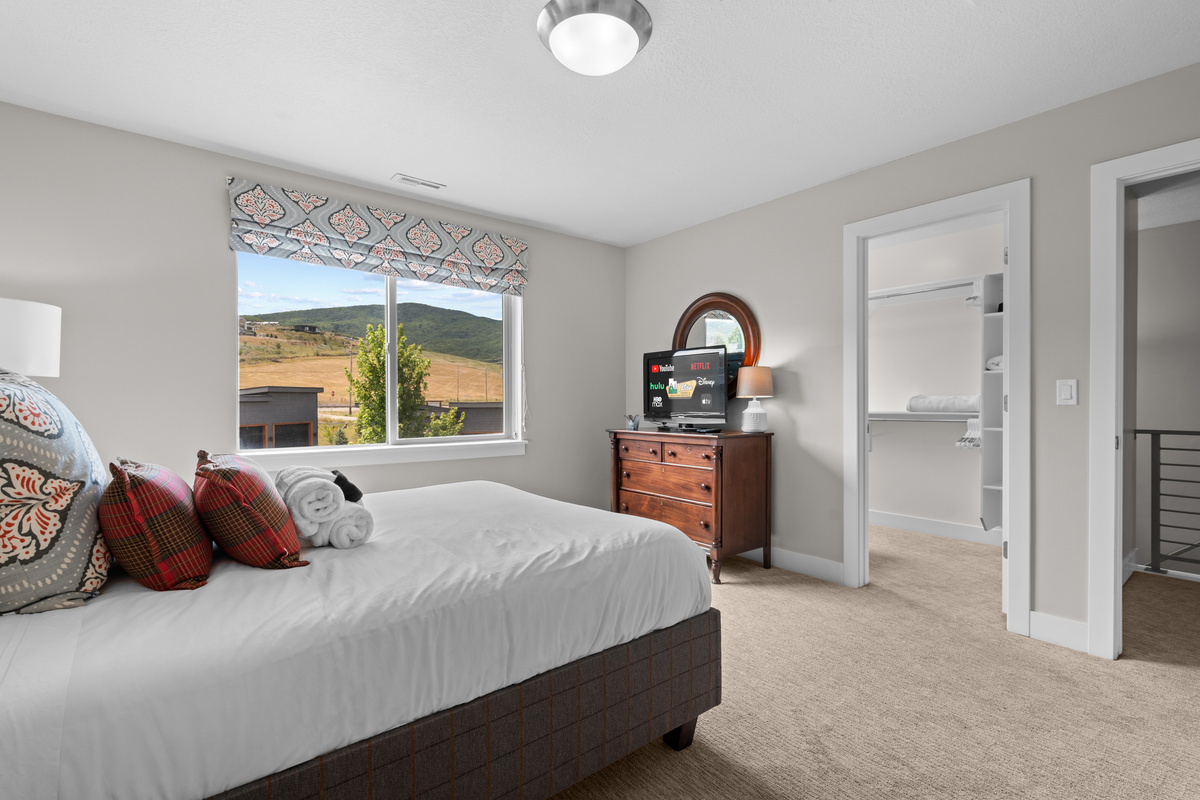 Wake up to beautiful mountain views from the comfort of your bed