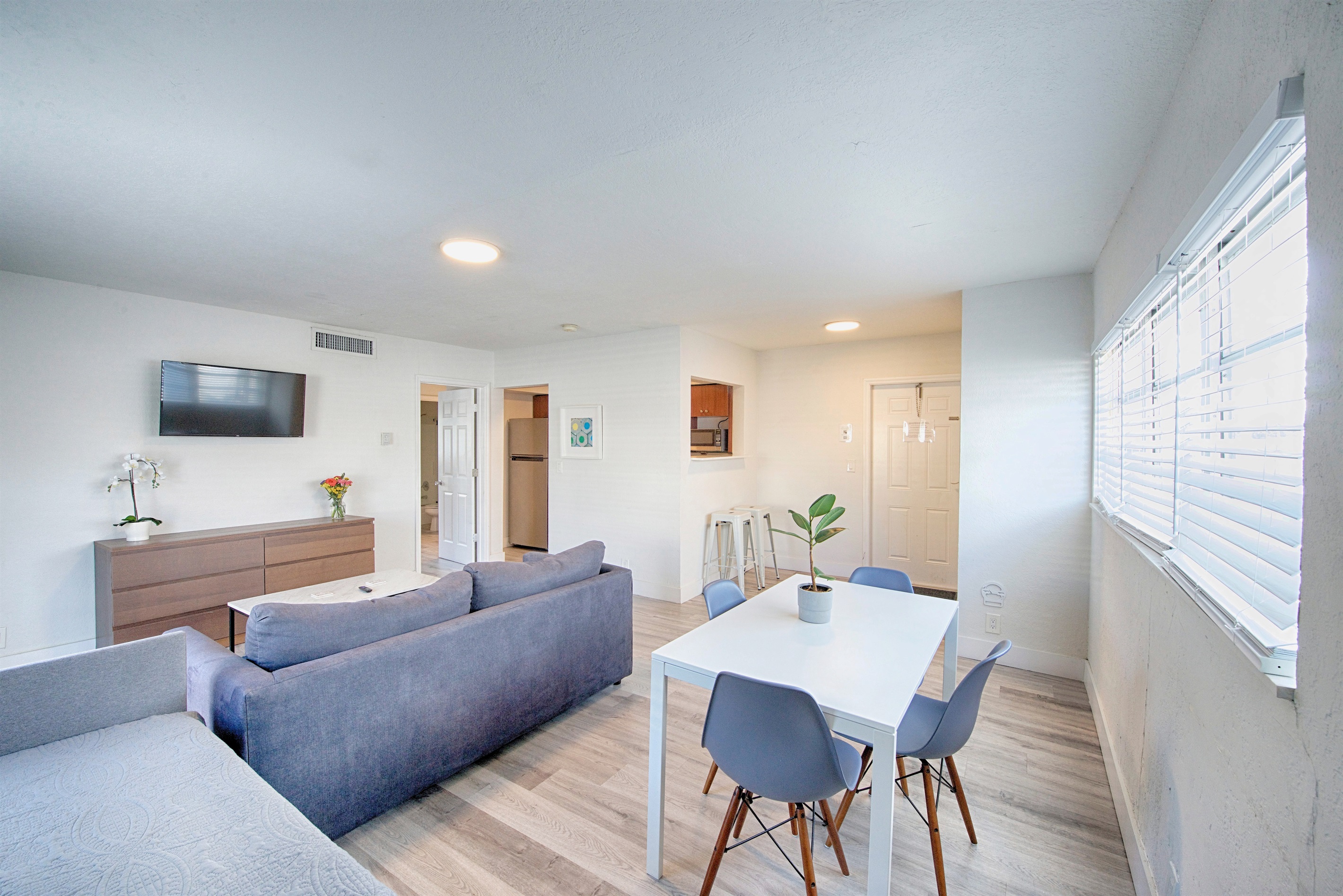 Opposite view with 40" smart TV and comfortable seating options