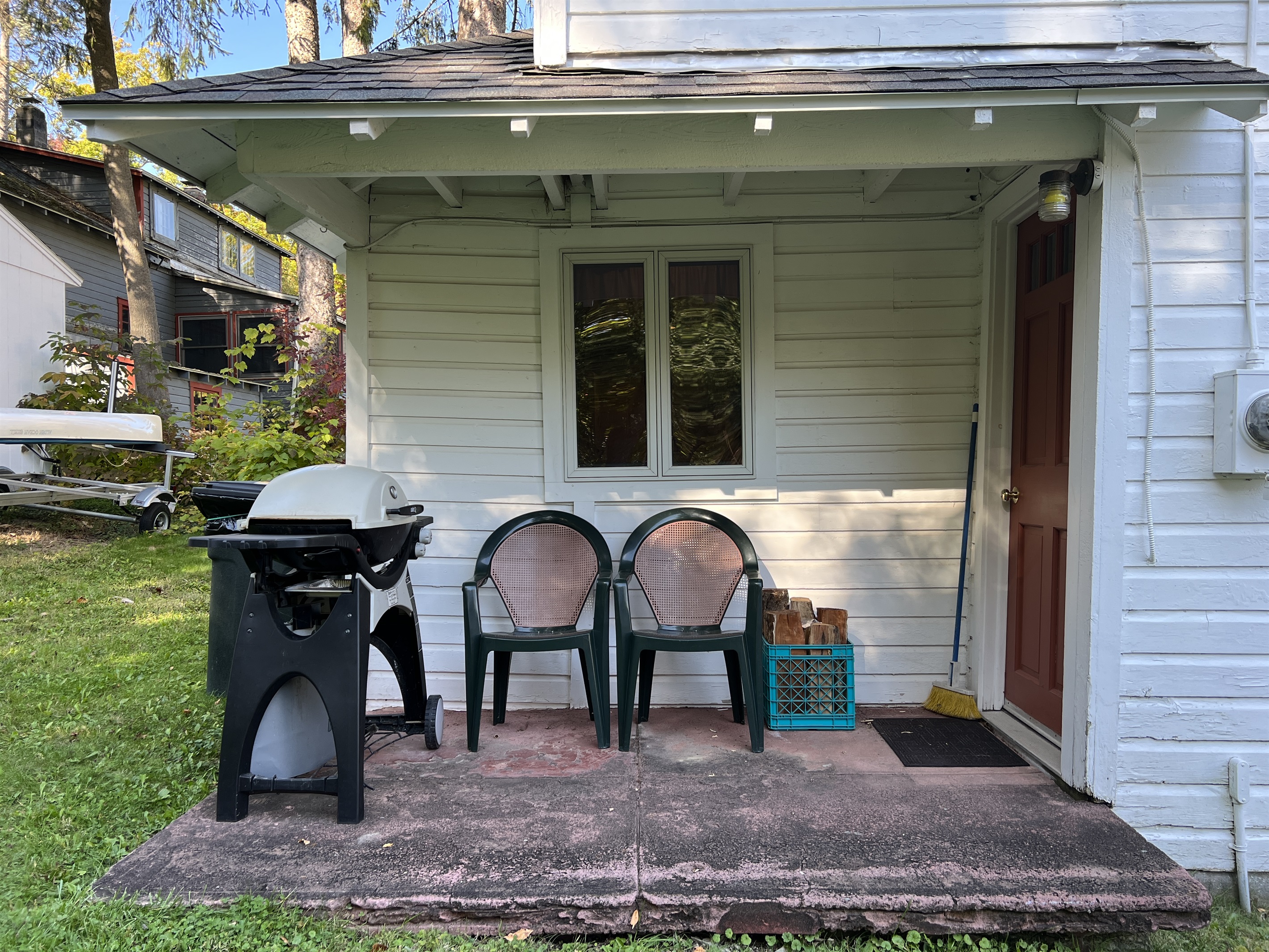 Grill area, easy access into the kitchen with side door.