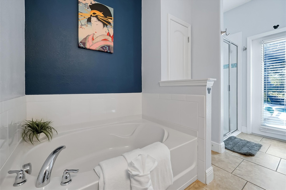 Guests in the Mulan room have a walk-in shower and soaking tub.