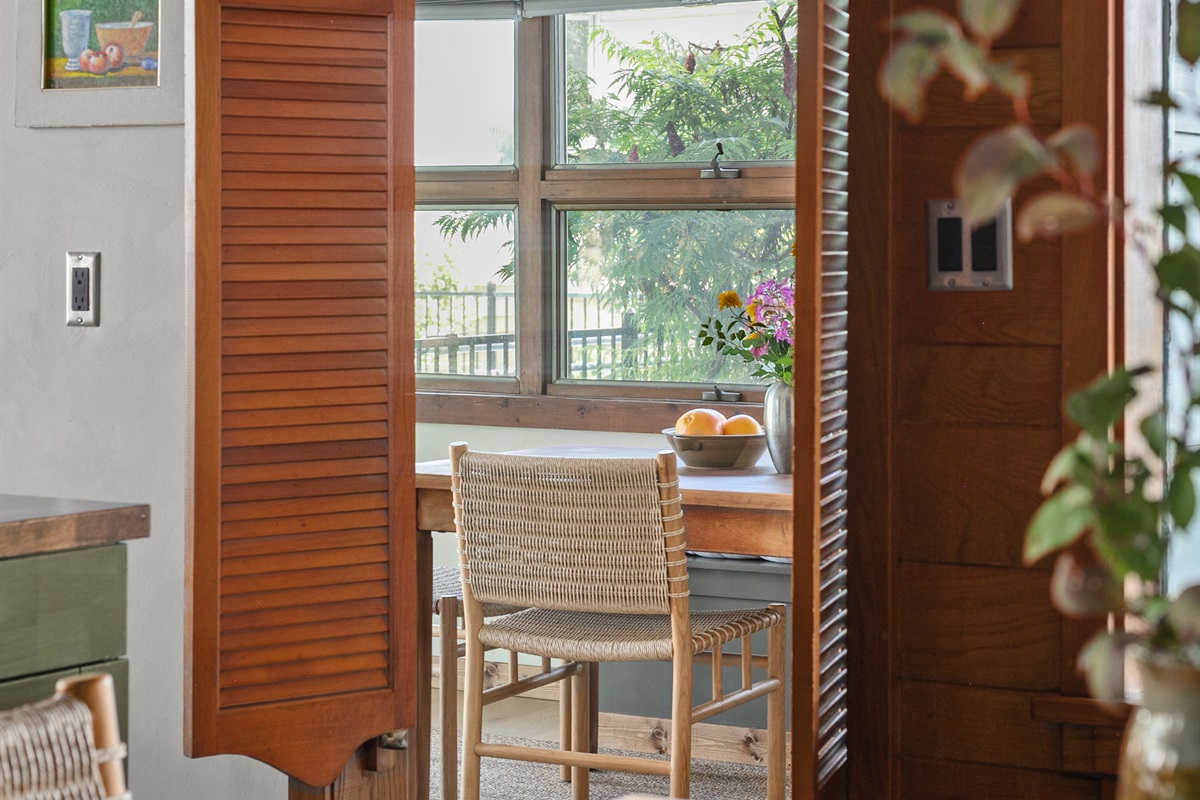 Morning sunlight spills into the breakfast nook, where modern décor meets cozy charm. From here, the home opens easily into the kitchen and dining room, creating a natural flow that keeps everyone connected.