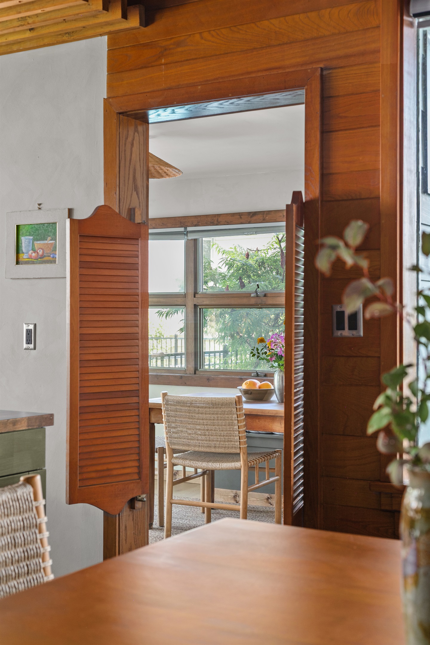 Morning sunlight spills into the breakfast nook, where modern décor meets cozy charm. From here, the home opens easily into the kitchen and dining room, creating a natural flow that keeps everyone connected.