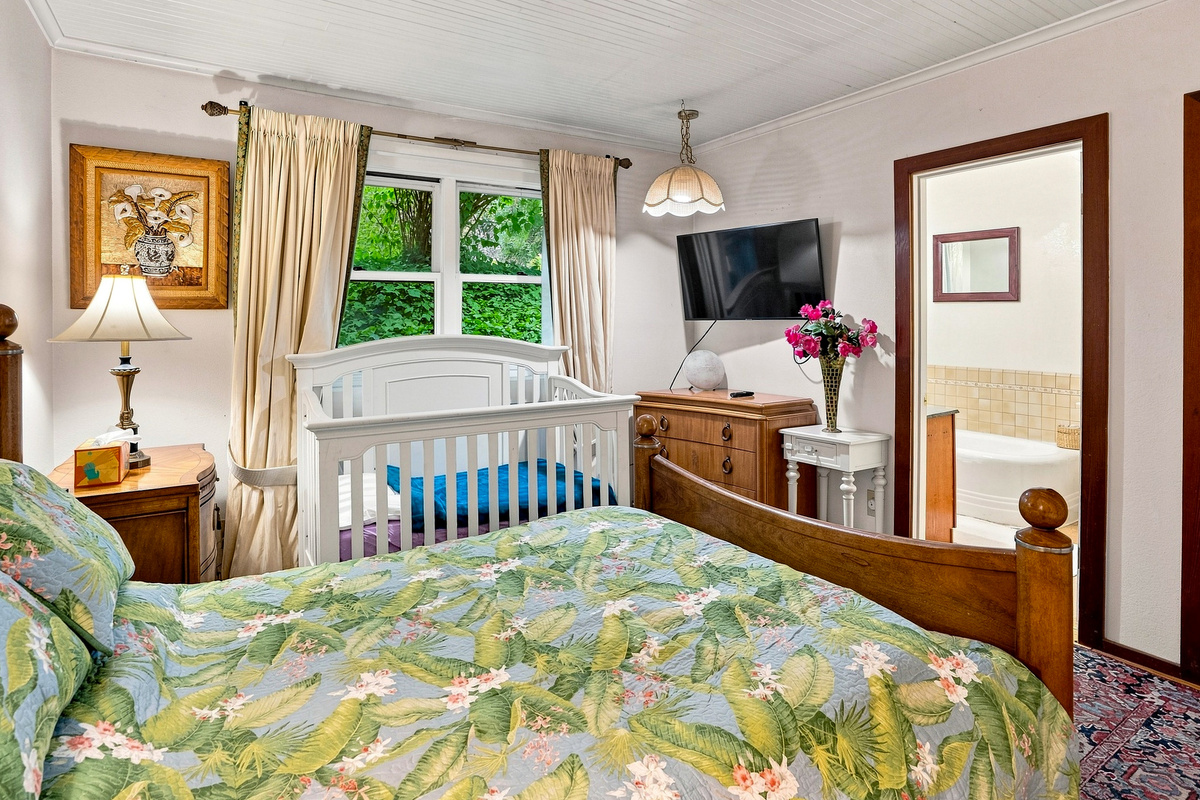 Bedroom 1 with Queen Bed and Crib