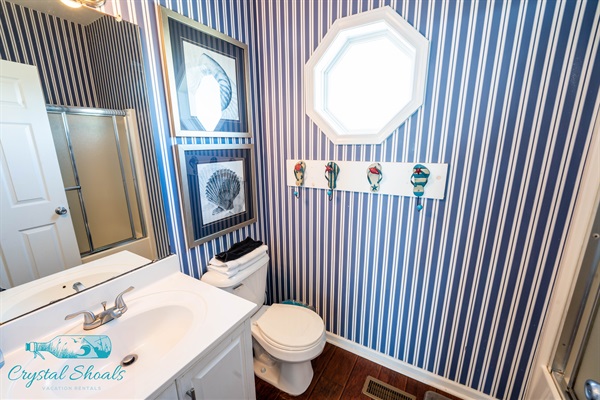 The main level boasts a full bath for the living area and bunk room 