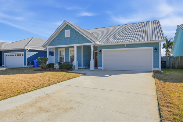 Private driveway and garage parking at this spacious PCB beach vacation rental.