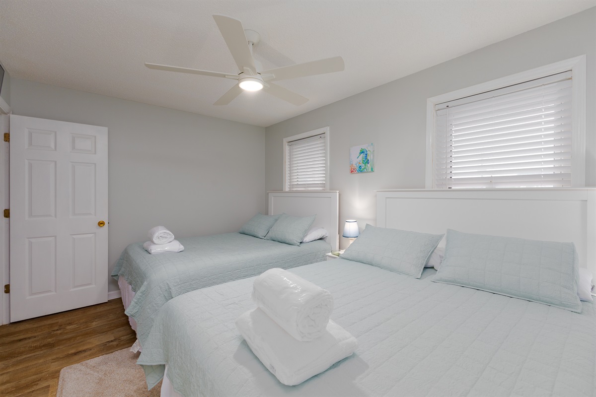 Double the comfort in this inviting bedroom setup!