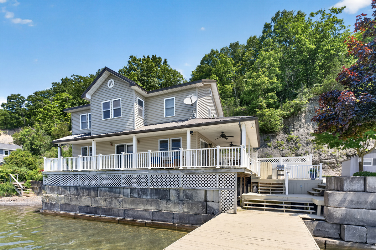 Lake-facing exterior with wraparound deck