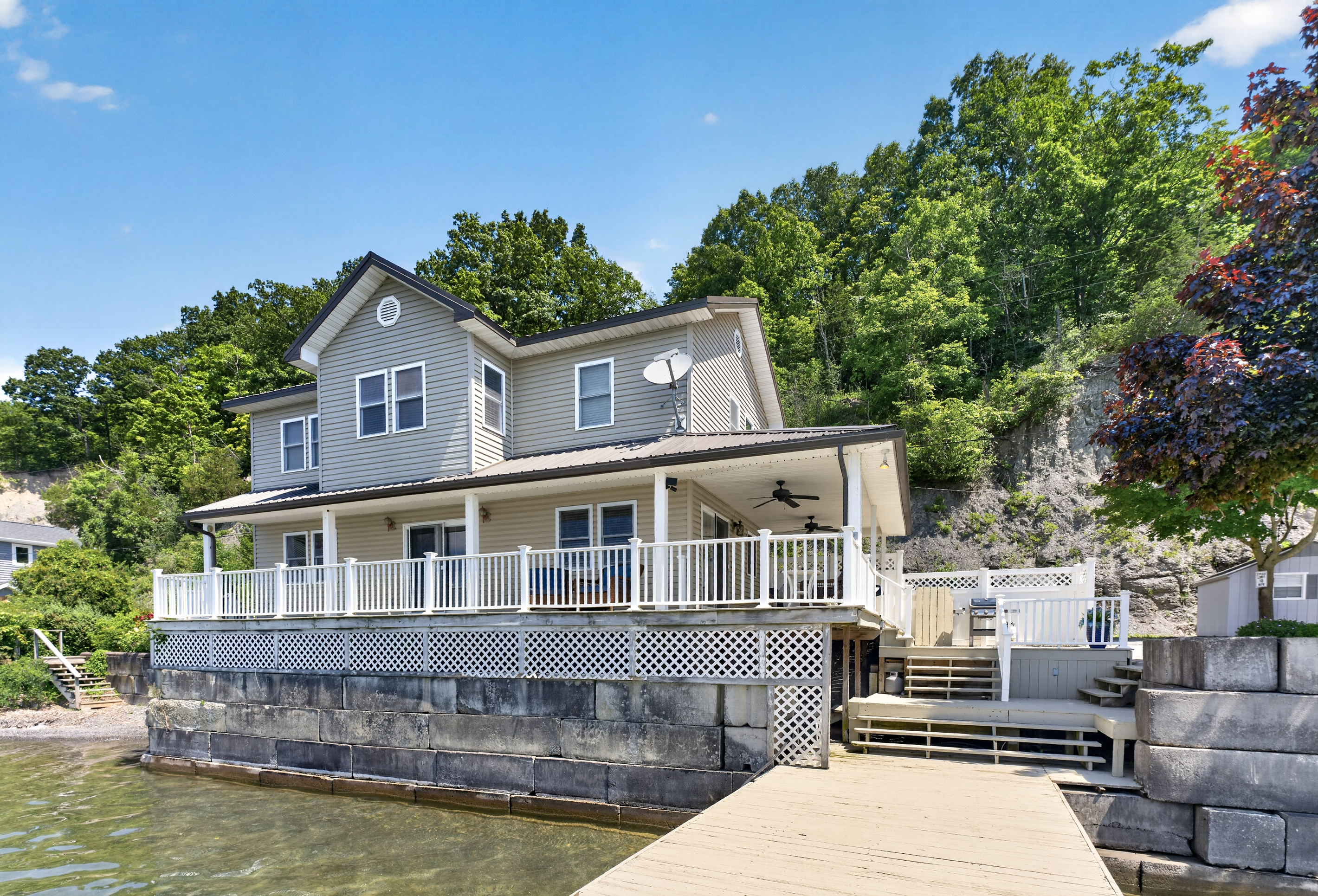 Lake-facing exterior with wraparound deck