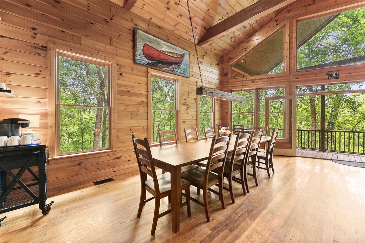 Solid wood dining table perfect for shared meals and cabin memories.