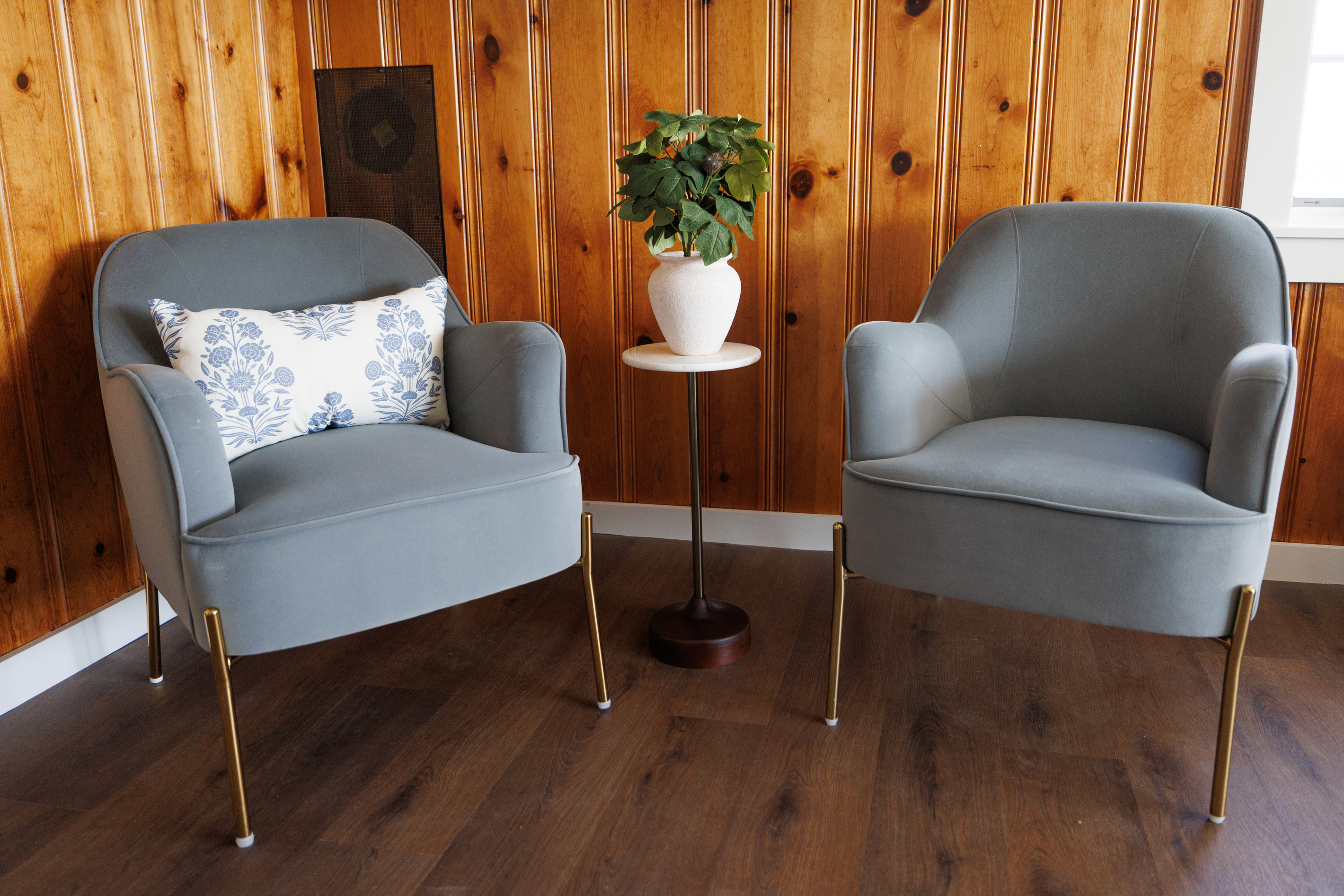 Slip into the reading corner while everyone else is out on the water — daylight pouring in, cove in your peripheral, nothing demanding attention.