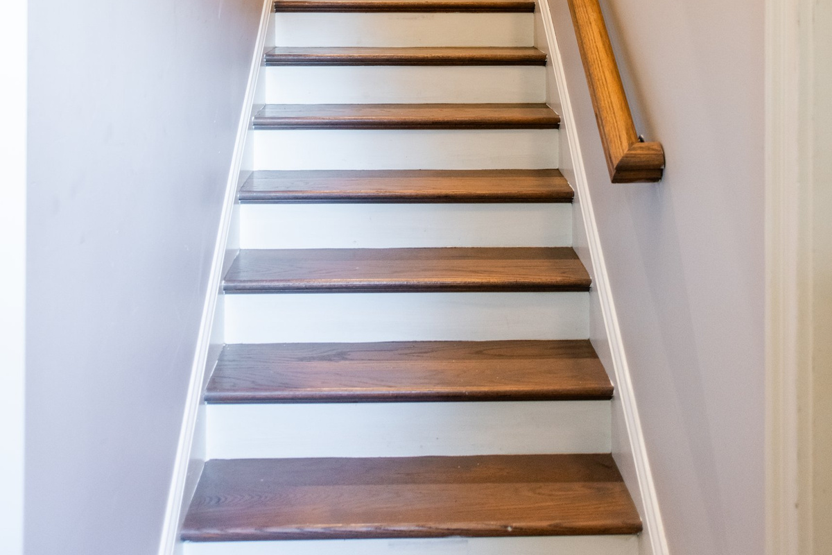 The staircase connecting the main living level to the bedrooms above.